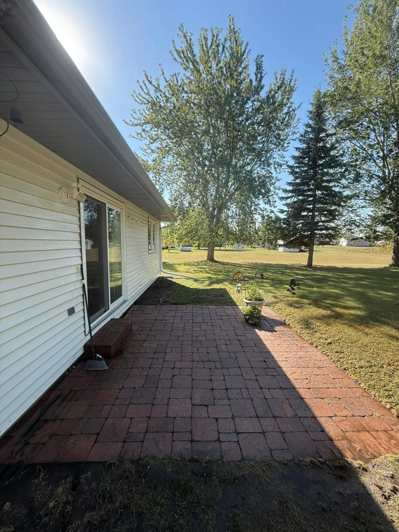 After: Brick paver walkway · restored color