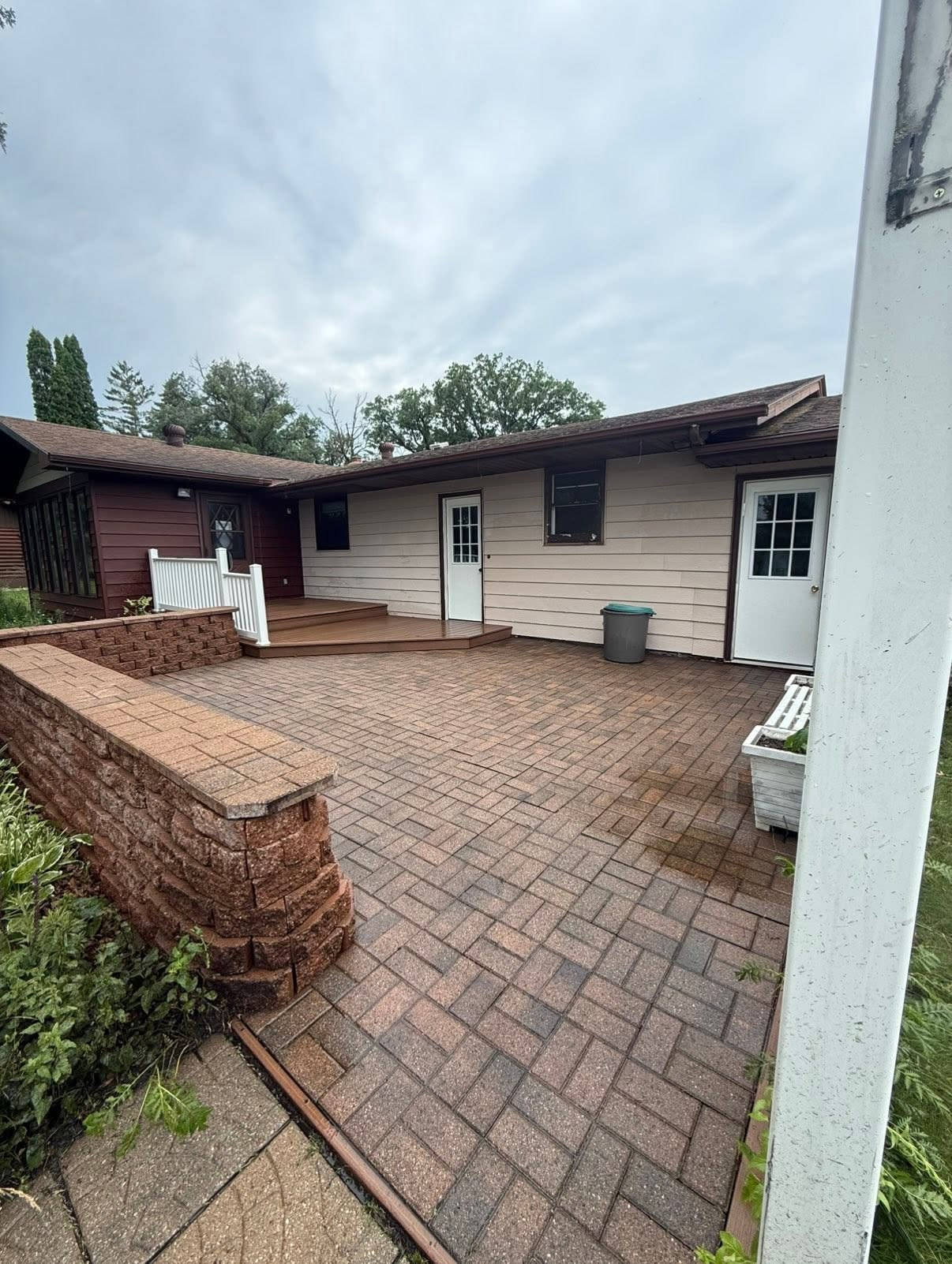 After: Paver patio · weeds & moss cleared